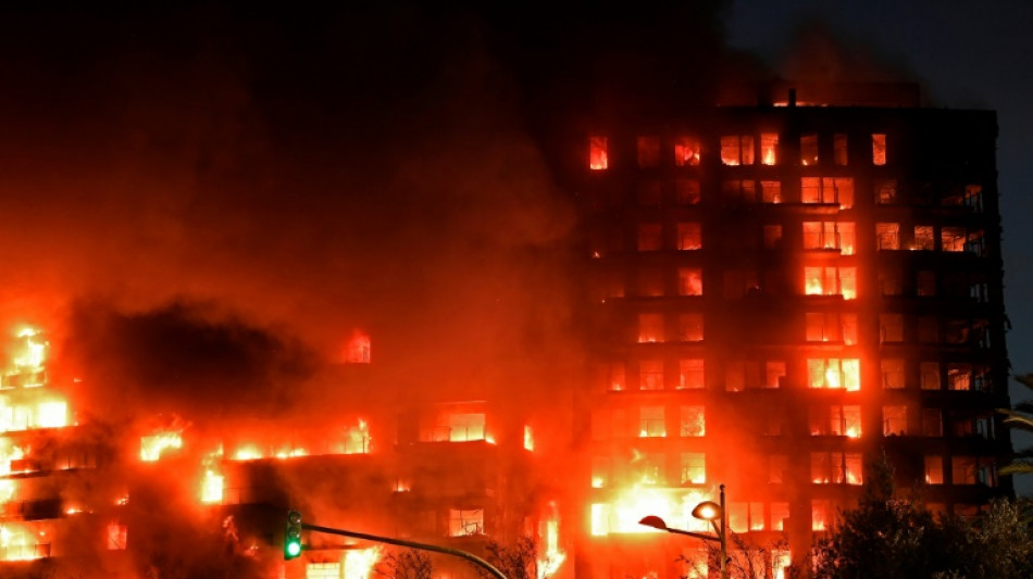 Four dead, 14 missing after fire guts Spanish apartment block