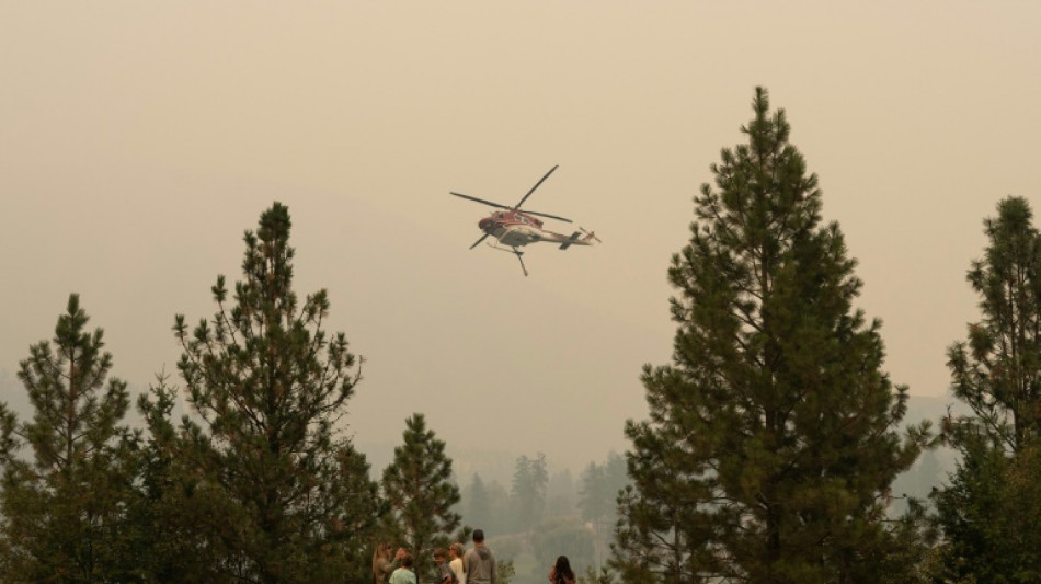 Canada wildfires spread and merge as evacuations continue