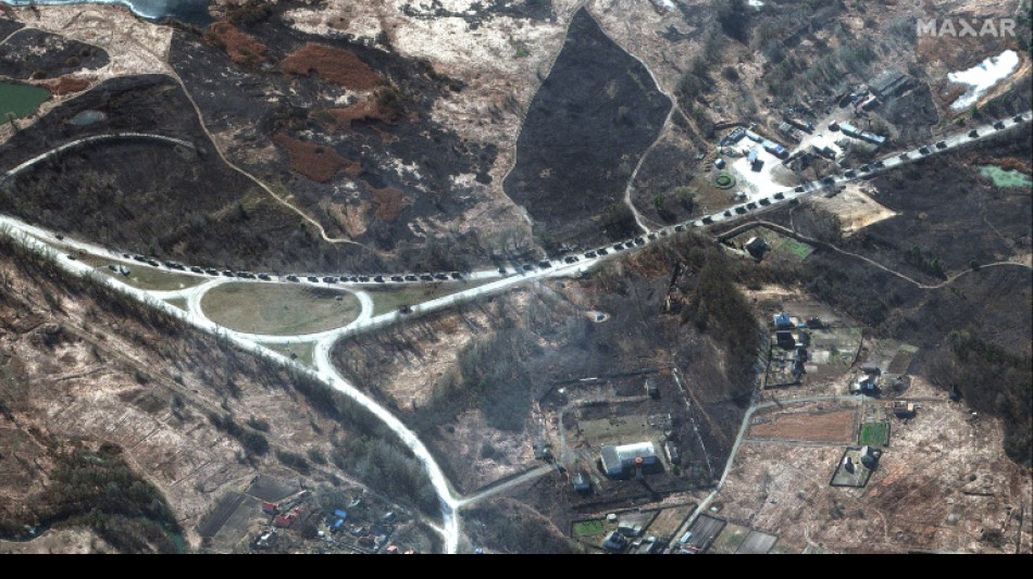 Russia invasion convoy masses near Ukraine capital