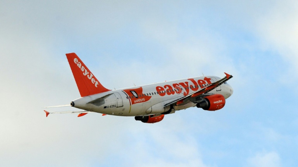 EasyJet hit by aviation disruption but slashes loss