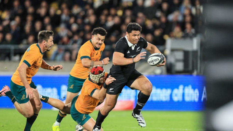  Clarke's two tries help All Blacks to 33-13 win over Wallabies 