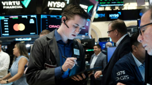 Wall Street réagit peu à la hausse des taux de la Fed