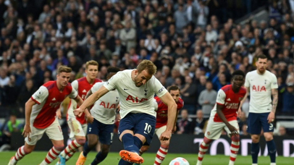 Spurs crush 10-man Arsenal to keep top-four bid alive