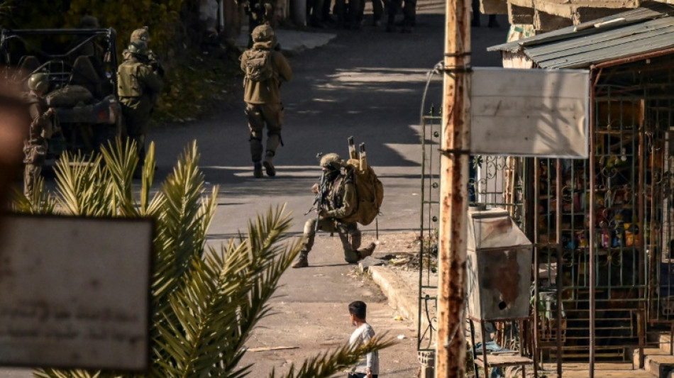 Israel army says troops shot Syrian protester in leg