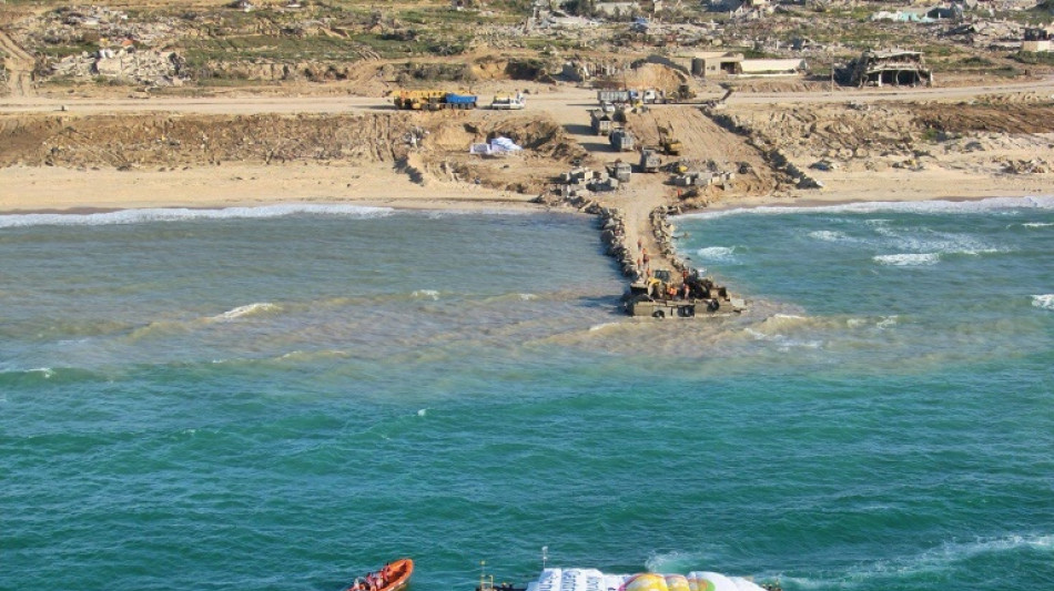 Truce efforts ongoing as first sea aid unloaded for hungry Gazans