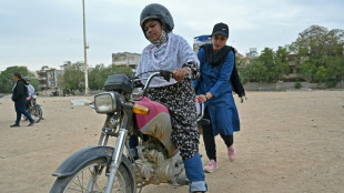 Pakistan's women 'Rowdy Riders' take on traffic and tradition