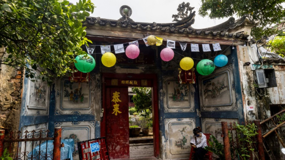 'The bottom line': Scuba divers help preserve historic Bangkok mansion