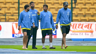 Rain delays New Zealand chase of 107 to beat India in first Test