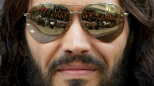 Accused of rape, Russell Brand speaks of 'distressing' week 