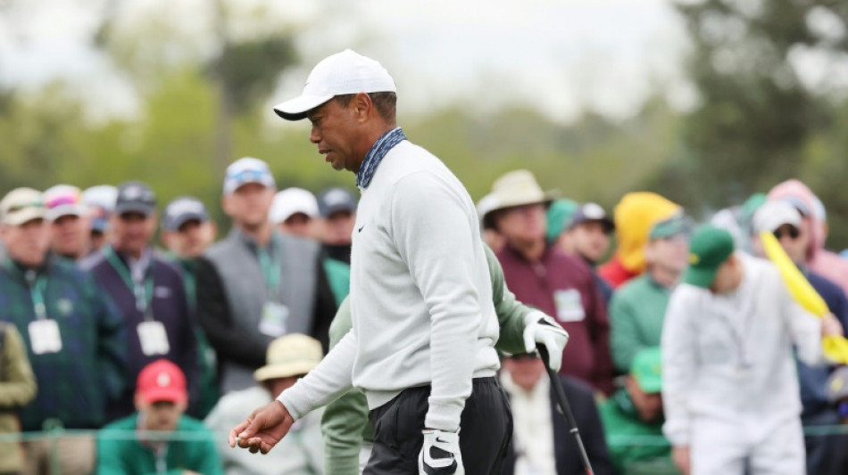 Woods drops out of contention as Scheffler shines at Masters