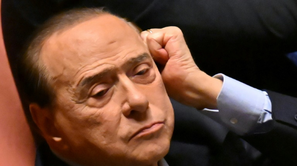 Italy's Berlusconi vows from hospital bed: 'I'll make it'