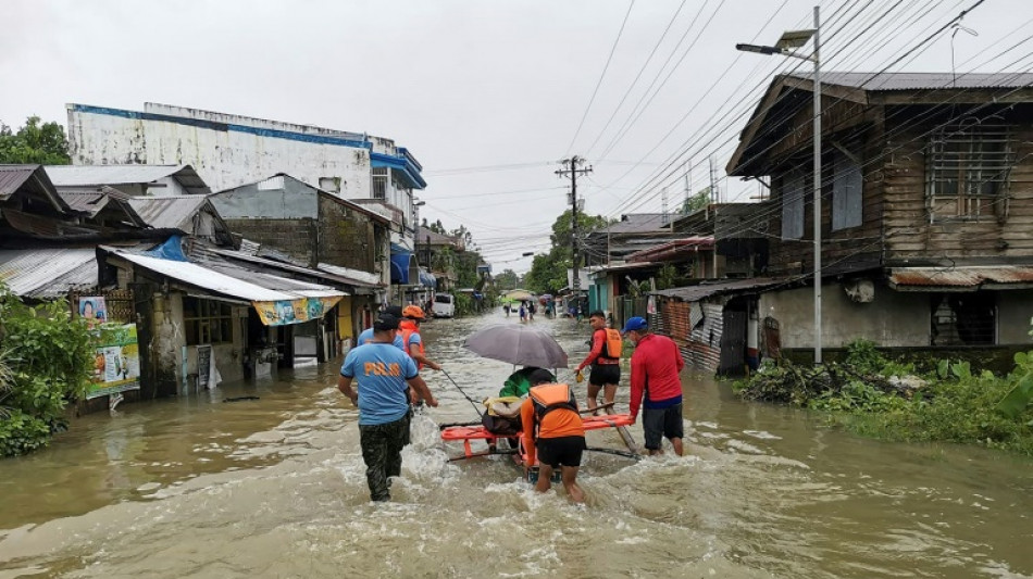 Search for survivors in Philippine villages hit by landslides