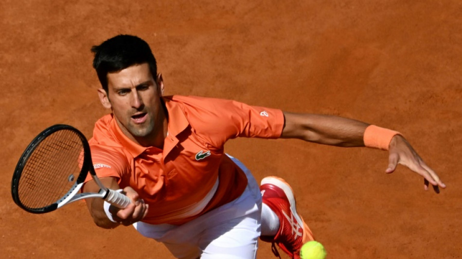 Djokovic sees off Karatsev to ease into last 16 in Rome