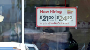 US unemployment ticks down as hiring accelerates