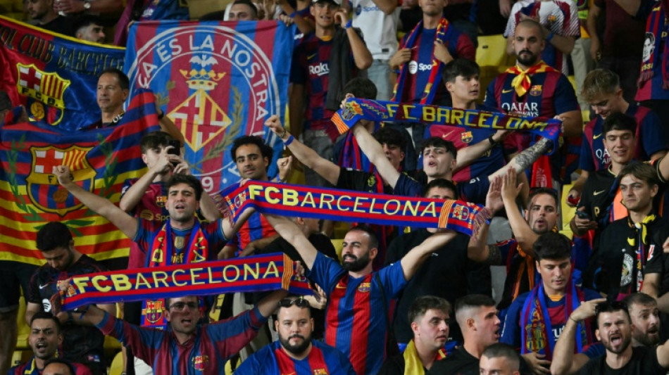  Barca fans barred from Champions League away game over racist banner 