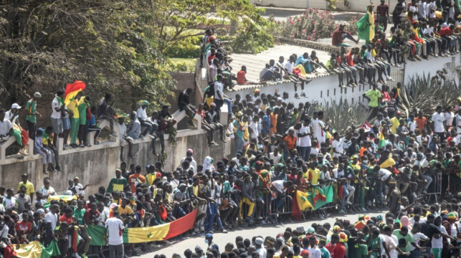 Ecstatic crowds greet victorious Senegal on Cup of Nations return