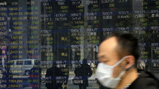 Asian markets struggle as traders contemplate more rate hikes