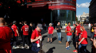 Tens of thousands of Liverpool fans turn Paris red