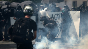 French police clash with water demonstrators after port blockade