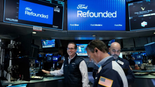 Wall Street termine en hausse, calmée par l'absence de nouvel accident bancaire