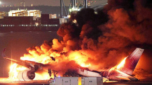 Probable collision entre deux avions à l'aéroport de Tokyo-Haneda