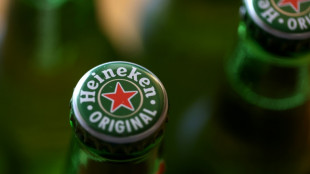 Heineken warns of slowdown in consumer demand