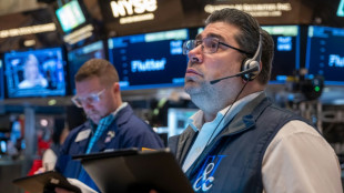 Wall Street termine divisée, la montée des taux obligataires pèse