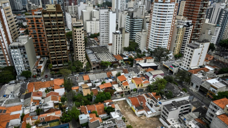 High-rises sweep Sao Paulo, but boom casts shadows