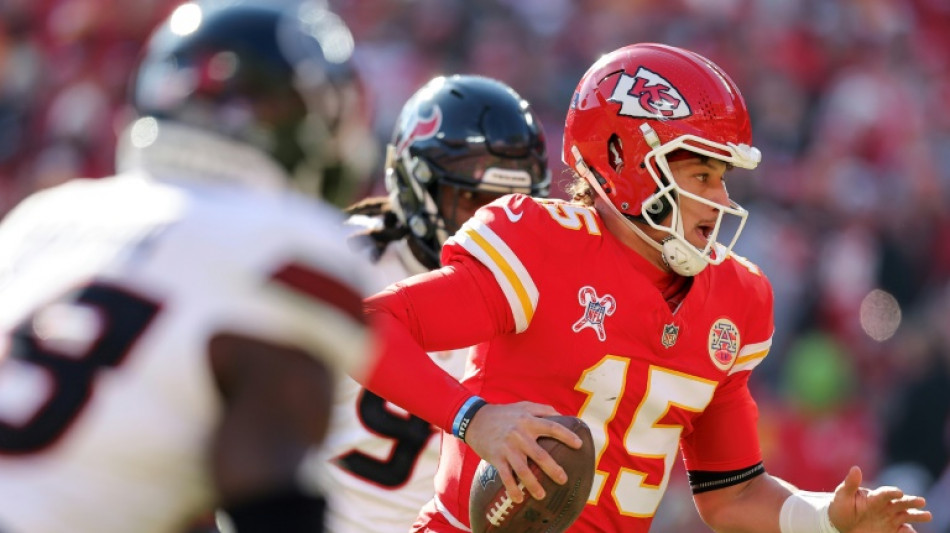 NFL-best Chiefs beat Texans while Ravens clinch playoff spot