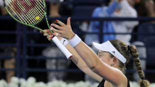 Ostapenko fights back against Halep to reach Dubai final