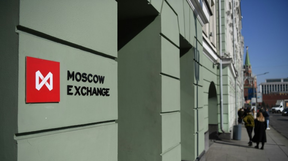 Russian stock market suspends dollar trades after US sanctions