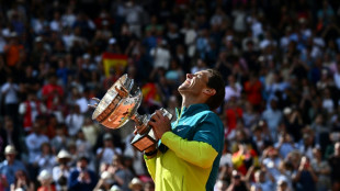 Nadal defies injury woes to win French Open again