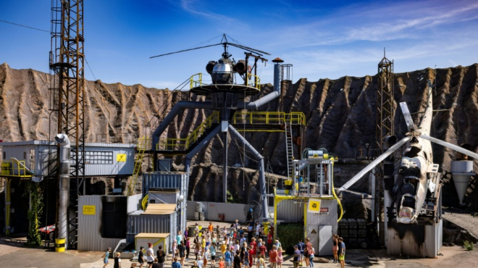 Strike-hit German stunt performers train kids during filming freeze