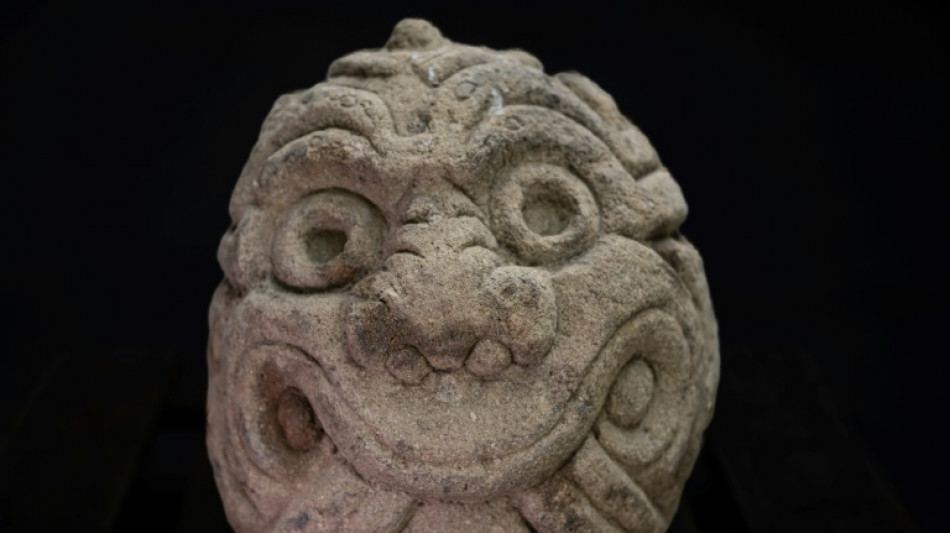 Swiss give 2,500-year-old stone sculpture back to Peru