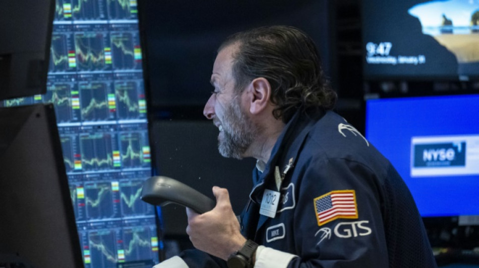 Wall Street termine en ordre dispersé, record pour le Dow Jones