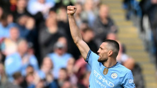 Man City sink Fulham to get title bid back on track