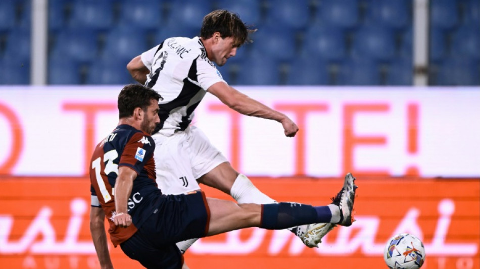 Revived Vlahovic shoots Juve top with double at fan-less Genoa