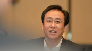 Boss of Chinese property giant Evergrande being held by police: report