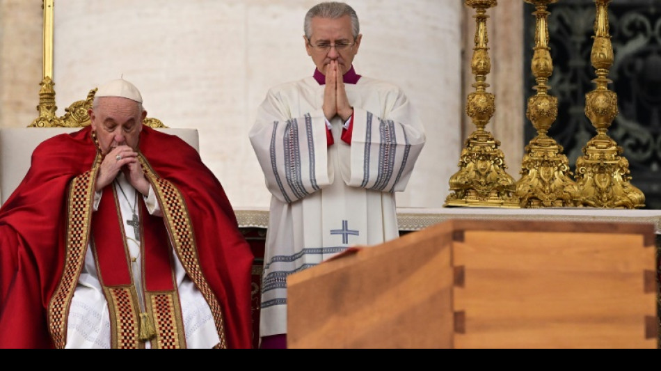 Pope Francis leads final farewell to Benedict before thousands