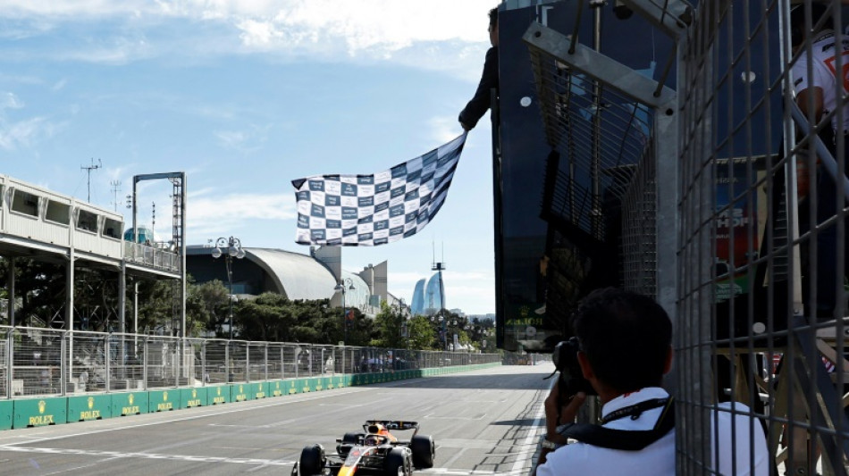 Verstappen wins in Baku to boost title defence as Leclerc limps out