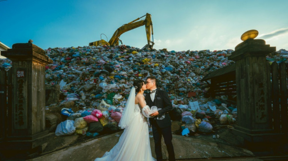 'Til trash do us part: Taiwan couple embraces garbage wedding shoot