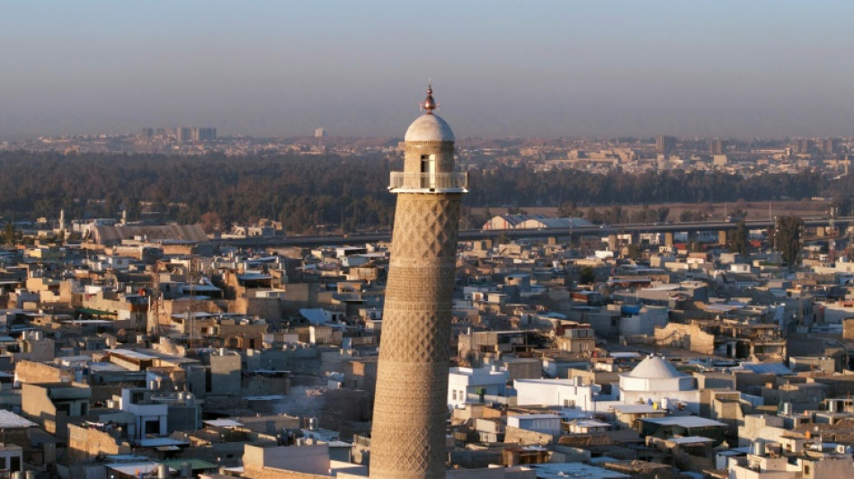 Iraq's famed 'hunchback' of Mosul rebuilt brick by brick