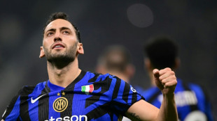 Calhanoglu fires Inter to Champions League win over angered Arsenal