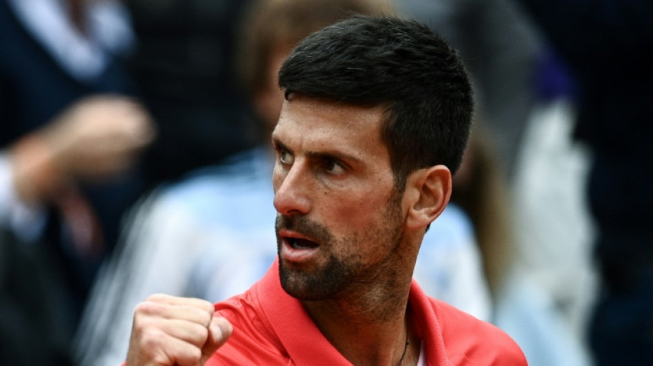 Djokovic says being No. 1 'best and worst' after reaching quarters